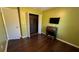 Bedroom with wood-look floors, and a window at 1592 Martin Luther King Ne Blvd, Winter Haven, FL 33881