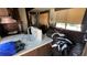 Compact kitchenette with sink and countertop at 1592 Martin Luther King Ne Blvd, Winter Haven, FL 33881