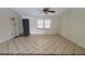 The living room is filled with natural light, complemented by neutral walls and tiled floors at 1592 Martin Luther King Ne Blvd, Winter Haven, FL 33881