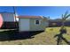 Outdoor storage shed in backyard providing extra space for tools and equipment at 1592 Martin Luther King Ne Blvd, Winter Haven, FL 33881