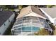 Aerial perspective of home featuring a screened-in pool enclosure, providing a private backyard oasis at 1717 Clubhouse Cv, Haines City, FL 33844