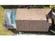 Overhead view of the home showcasing the roofline and pool at 1717 Clubhouse Cv, Haines City, FL 33844