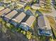 Aerial view showcasing houses with private pools in a community at 1739 Morning Star Dr, Clermont, FL 34714