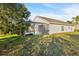House exterior showcasing fenced backyard at 1739 Morning Star Dr, Clermont, FL 34714