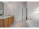 Bathroom features double vanity and garden tub at 1739 Morning Star Dr, Clermont, FL 34714