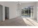 Bright bedroom with sliding doors opening to the pool at 1739 Morning Star Dr, Clermont, FL 34714