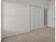 Bright bedroom with neutral walls and carpet at 1739 Morning Star Dr, Clermont, FL 34714