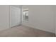 Spacious bedroom with carpet and double doors at 1739 Morning Star Dr, Clermont, FL 34714