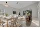 Bright living room with a dining area and access to backyard at 1739 Morning Star Dr, Clermont, FL 34714
