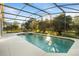 Relaxing screened pool and spa at 1739 Morning Star Dr, Clermont, FL 34714