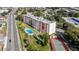 Condo building with pool and tennis court, near a main road at 1776 6Th St Nw # 209, Winter Haven, FL 33881