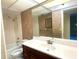 Clean bathroom with a tub, shower, and vanity at 1776 6Th St Nw # 209, Winter Haven, FL 33881
