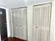 Hallway with two closets offering ample storage at 1776 6Th St Nw # 209, Winter Haven, FL 33881