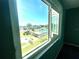 Community pool view from condo window at 1776 6Th St Nw # 209, Winter Haven, FL 33881