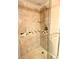 Clean shower with tile surround and glass enclosure at 1776 6Th St Nw # 209, Winter Haven, FL 33881