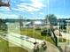 Outdoor shuffleboard courts with lake view at 1776 6Th St Nw # 209, Winter Haven, FL 33881