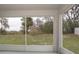 Screened porch overlooking the backyard at 197 Cloverbrook Trl, Davenport, FL 33837