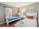 Twin bedroom with two white beds and a shared vanity at 2143 Calabria Ave, Davenport, FL 33897
