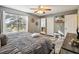 Bright bedroom with king bed and ensuite bathroom access at 2143 Calabria Ave, Davenport, FL 33897