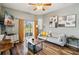 Open concept living area with hardwood floors, neutral walls and sliding glass door at 2143 Calabria Ave, Davenport, FL 33897