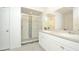 Modern bathroom with double sinks, a large shower, and marble accents at 233 Tiffany Ct, Kissimmee, FL 34758