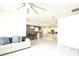 Open living room with a view of the kitchen and dining area at 233 Tiffany Ct, Kissimmee, FL 34758