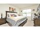 Spacious main bedroom with large bed, window, and plenty of light at 233 Tiffany Ct, Kissimmee, FL 34758