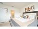 Main bedroom with a king-size bed and an ensuite bathroom at 233 Tiffany Ct, Kissimmee, FL 34758