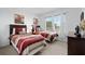 Bedroom with two twin beds and dark wood furniture at 256 Lancaster Dr, Davenport, FL 33897
