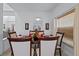 Formal dining room with a dark wood table and six chairs at 256 Lancaster Dr, Davenport, FL 33897