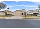 Two-story house with brick driveway at 256 Lancaster Dr, Davenport, FL 33897
