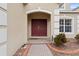 Elegant double door entry with brick walkway at 256 Lancaster Dr, Davenport, FL 33897