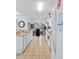 Bright kitchen with white cabinets and tile floor at 256 Lancaster Dr, Davenport, FL 33897