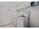 Laundry room with washer, dryer, and shelving for storage at 256 Lancaster Dr, Davenport, FL 33897