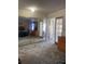 Spacious bedroom with mirrored closet doors and carpet at 2681 Robin Ave, Kissimmee, FL 34744