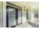 Private patio with french doors and windows at 280 Celebration Blvd # 108, Celebration, FL 34747