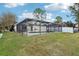 Spacious backyard with an enclosed pool area, ideal for Gathering gatherings and outdoor entertainment at 2993 Stillwater Dr, Kissimmee, FL 34743