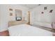 Twin bedroom featuring two beds, matching side tables, and dresser at 2993 Stillwater Dr, Kissimmee, FL 34743