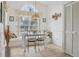 Bright breakfast nook boasts a large window, window seating, and tiled floors, creating a cozy and inviting space at 2993 Stillwater Dr, Kissimmee, FL 34743