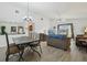 Bright, open living room showcases vaulted ceilings, a large window view and comfortable seating for a welcoming atmosphere at 2993 Stillwater Dr, Kissimmee, FL 34743