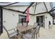 Cozy covered patio with an outdoor dining set, with sliding doors for indoor-outdoor living at 2993 Stillwater Dr, Kissimmee, FL 34743