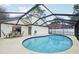 Enclosed pool area perfect for enjoying the outdoors while staying protected from the elements at 2993 Stillwater Dr, Kissimmee, FL 34743