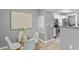 Bright dining area with glass table and four chairs at 3036 Parkway Blvd # 104, Kissimmee, FL 34747
