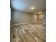 Bright dining area with wood-look tile floors at 3036 Parkway Blvd # 104, Kissimmee, FL 34747