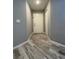 Light and bright entryway with wood-look tile floors at 3036 Parkway Blvd # 104, Kissimmee, FL 34747