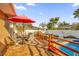 Enjoy dining alfresco on this deck overlooking the pool at 306 Boger N Blvd, Lakeland, FL 33803