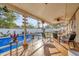 Relaxing screened lanai with seating area overlooking a sparkling pool at 306 Boger N Blvd, Lakeland, FL 33803