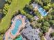 Community pool and playground with surrounding green space at 312 Lucaya Loop # B5/U312, Davenport, FL 33897