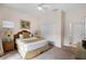 Spacious bedroom with a queen bed and large closet at 312 Lucaya Loop # B5/U312, Davenport, FL 33897