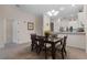 Bright dining room features a glass-top table with six chairs at 312 Lucaya Loop # B5/U312, Davenport, FL 33897